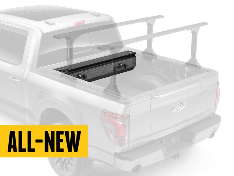 RetraxPRO EZ-OFF FRC-4000 hero marketing image with REALTRUCK ALL-NEW yellow badge overlay on a silver Ford F-150 with the cover installed, front three-quarter angle