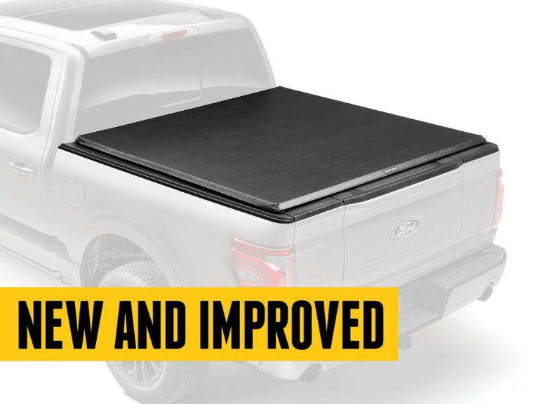 RealTruck TruXedo TruXport GEN 2 hero marketing image with the cover closed on a ghosted/dimmed silver F-150 silhouette, NEW AND IMPROVED yellow text overlay