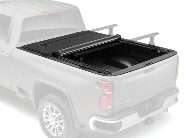 RealTruck TruXedo Pro X15 TS cover partially open on a truck, showing the integrated T-slot rails on the side rail, top-down view
