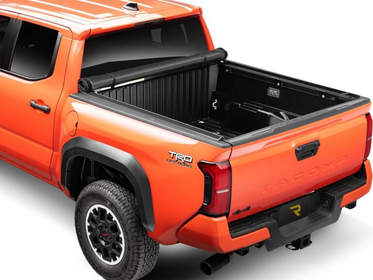 RealTruck TruXedo Lo Pro cover partially open, exposing the truck bed with the rolled tarp visible