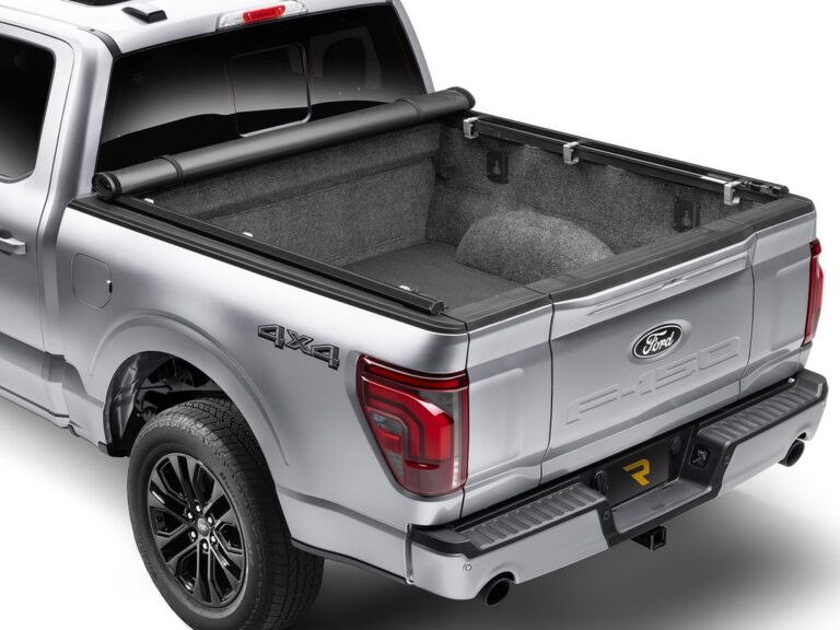 RealTruck TruXedo TruXport GEN 2 cover rolled fully up to the cab on a silver F-150 STX 4x4, demonstrating 100% bed access