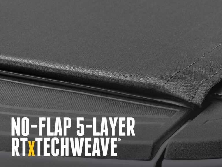 RealTruck TruXedo Pro X15 TS cover fully closed on a truck, low-profile view showing the 33% lower stance than the Lo Pro, with RTxTechWeave 5-layer material texture