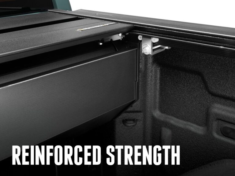 RetraxPRO MX reinforced storage canister with fortified end bracket and mounting hardware, REINFORCED STRENGTH marketing overlay close-up