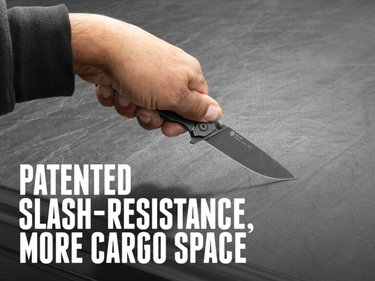 RealTruck BAK Revolver X2 slash-resistance demonstration with a utility knife, PATENTED SLASH-RESISTANCE MORE CARGO SPACE text
